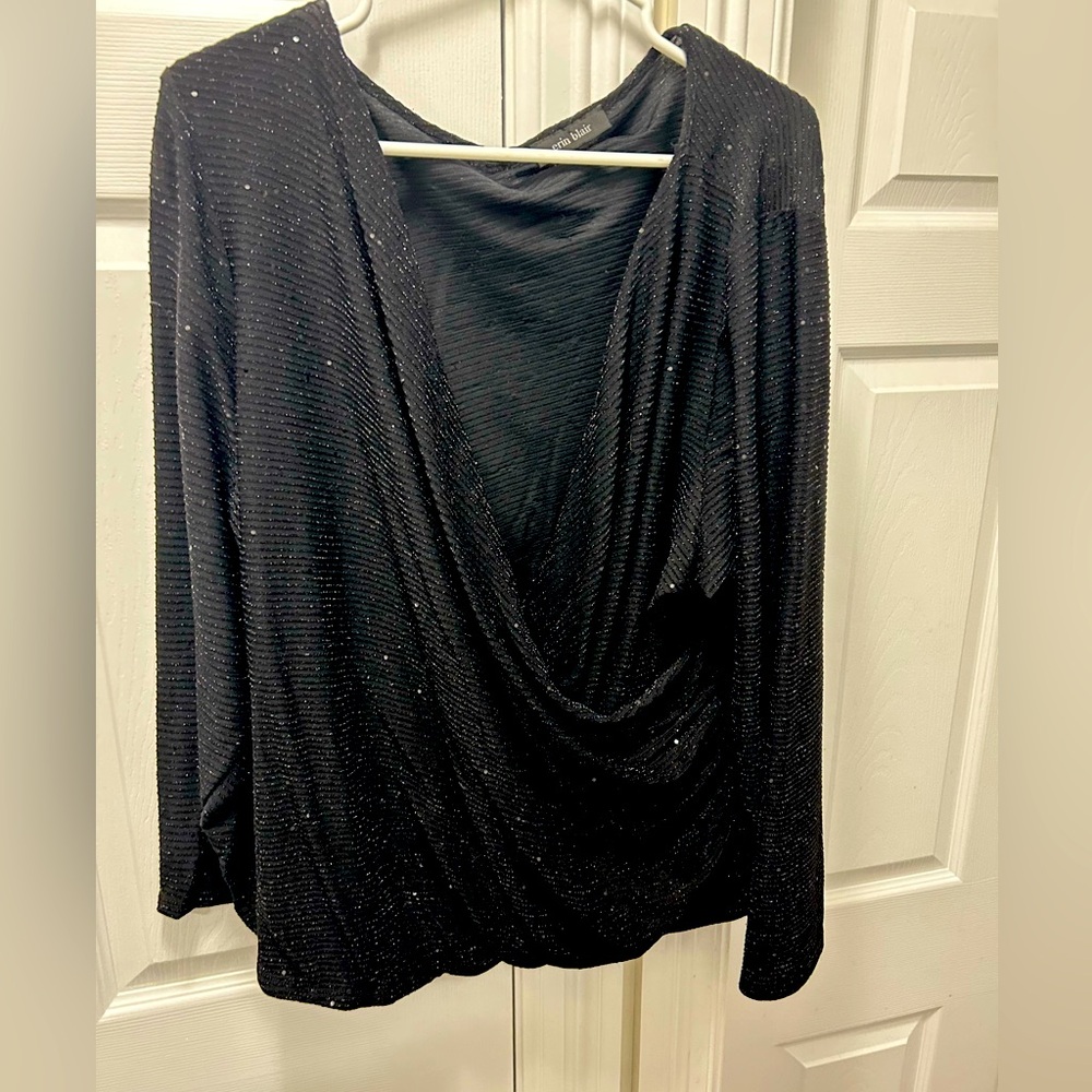Glitzy sequin black New Year’s Eve wrap top, stretchy and figure-flattering
